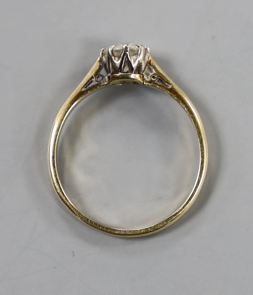 An 18ct, plat and solitaire diamond set ring, size Q, gross weight 2.4 grams.